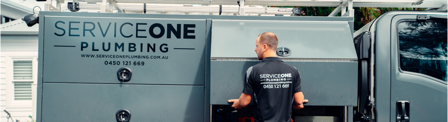 Service One Plumbing Truck and a Plumber Opening it